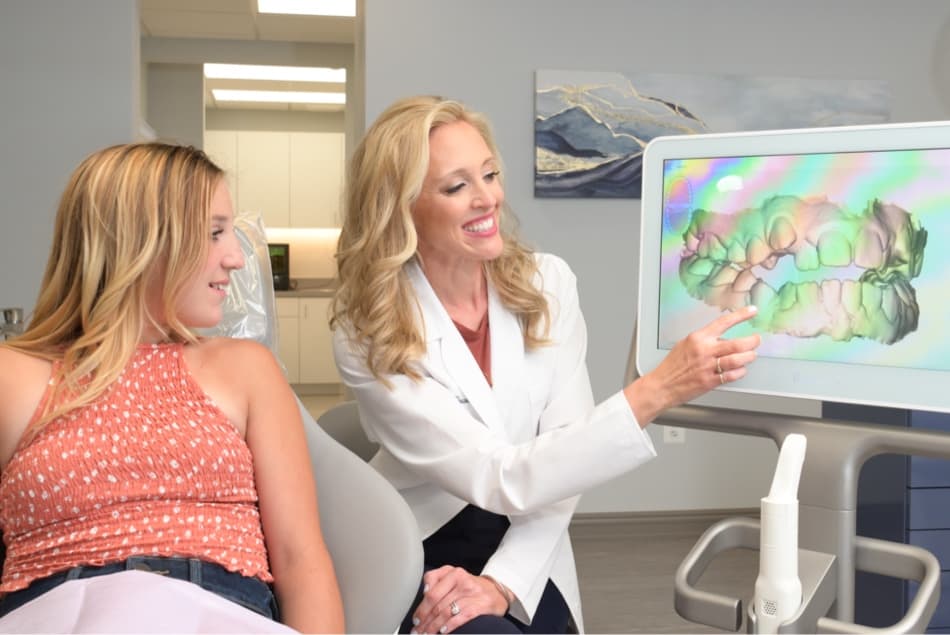 young patient smiling during free consultation