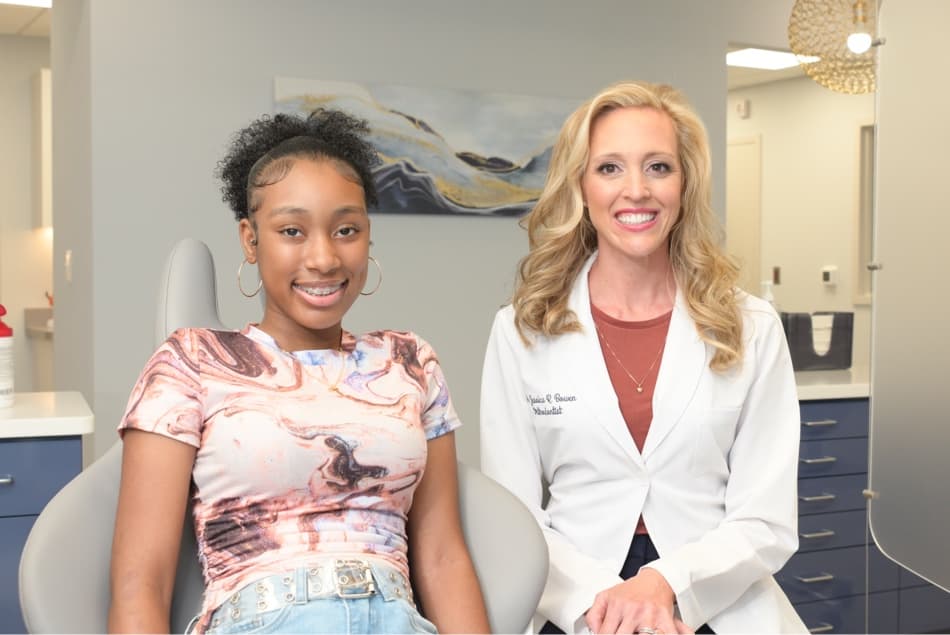 young patient smiling during free consultation